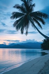 Wall Mural - Tropical beach at dusk with palm trees and calm waves under a colorful sky