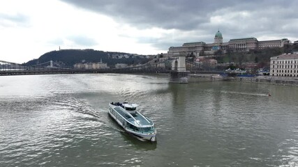 Canvas Print - Danube River Ferry Cruises in Budapest, Boat Tours. Hungary. Buda Palace in Background