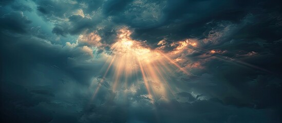 Wall Mural - Lovely sunlight shines through dark clouds in the evening sky creating a stunning light effect as it attempts to break through. Copy space image. Place for adding text and design