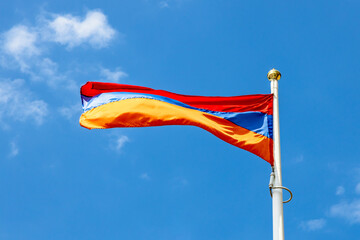 Armenian state flag and blue sky in background