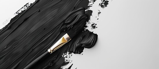Poster - Black paint and a paintbrush on a white paper background. Copy space image. Place for adding text and design