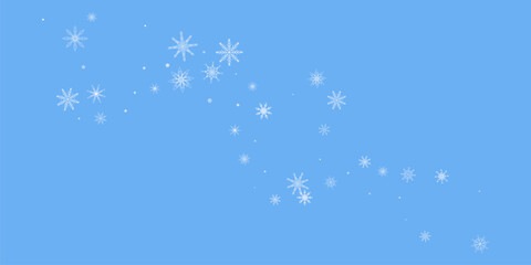 Snowflakes. Snow, snowfall. Falling scattered white snowflakes on a blue background.