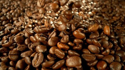 Poster - Roasted coffee beans falling on heap.