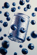 © Nikname - A can of soda with blue liquid and blueberries floating in the air