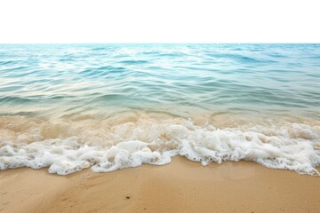 Poster - A powerful wave crashes onto a sandy beach, with water splashing and foam forming