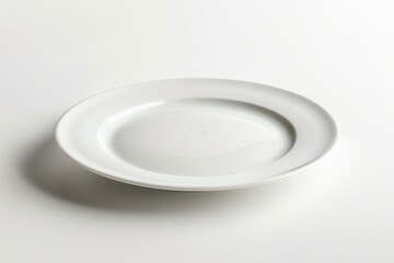 Canvas Print - A simple white plate sitting on top of a table