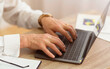 © Prostock-studio - Closeup Of Senior Man's Hands Working Typing On Laptop Sitting In Office. Selective Focus, Cropped