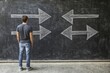© Leo - Man standing in front of chalkboard with arrows pointing in opposite directions symbolizing conflicting choices career decisions and the challenge of navigating personal or professional crossroads