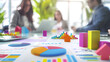 © Muhd Harith - Team collaboration around a table, pie chart and progress bar icons floating
