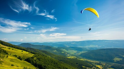 paraglider floating gracefully above a green valley, with hills and forests stretching out below