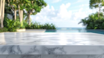 A serene marble surface overlooking a tranquil pool and lush greenery under a blue sky.