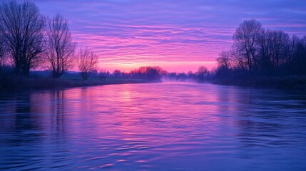 Wall Mural - A flowing river under a twilight sky where the water reflects the rich tones of Future Dusk The soft ripples on the water catch the fading light creating a peaceful yet dramatic natural scene with the