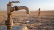 © Eduards V. - Rusty faucet with a single water droplet in a parched landscape, highlighting the lack of water