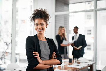 Wall Mural - Crossed arms, happy and portrait of businesswoman with team in office for leadership in career. Confident, smile and female manager with group of financial advisors for pride of job in workplace.