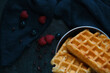 © borispain69 - Belgian waffles on a dark background