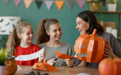 Canvas Print - Happy family preparing for Halloween.