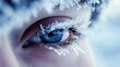© Theeranan - A close-up of frost-covered eyelashes on a person standing outside in the extreme cold of Oymyakon.