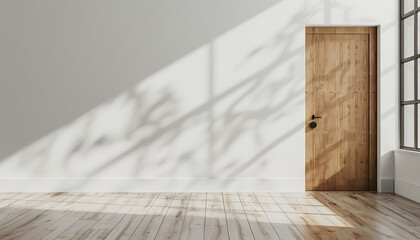 Aufkleber - A minimalist interior featuring a wooden door and sunlight casting delicate shadows on the floor, creating a serene atmosphere.