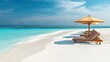© Theeranan - Sunbeds with umbrellas on the white sandy beaches of a luxury resort in the Maldives.