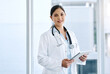 © SensSai/peopleimages.com - Happy woman, portrait and doctor with tablet for medical research, appointment or service at hospital. Young, female person or healthcare employee with technology for health consultation at clinic