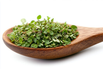 A wooden spoon with fresh thyme leaves isolated on a white background, close up, detailed photo.