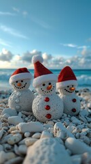 Wall Mural - Three snowmen wearing red Santa hats are sitting on a beach made of white pebbles against the backdrop of the blue ocean and sky. AI.