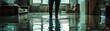 © BonzEarthsnapper - In a room flooded with water, a person in waterproof boots stands amidst the submerged furniture, the reflective surface of the water accentuating the severity of the situation. realistic photo