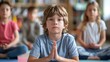 © AnastasiiaCherkas - Mindful Children Practicing Meditation for Mental Health Day in a Calm Classroom Setting