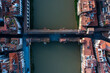 © AmazingAerialAgency - Aerial view of the beautiful historic city with medieval architecture and scenic river, Florence, Italy.