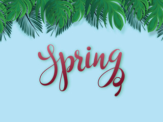 Canvas Print - Calligraphy of Spring on Light blue background decorated with green tropical leaves.