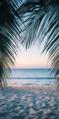 Wall Mural - Palm leaves frame a beach scene