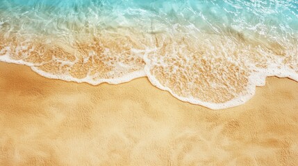 Foamy waves on a sandy beach