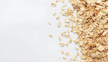 Wall Mural - oat flakes isolated on white background. Top view	