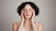 © Intelligent Horizons - Portrait of a Distraught Woman with Her Head in Her Hands Showing Intense Emotional Distress Anxiety and Despair
