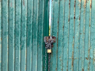 old rusty lock on a metal door