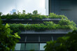 © Piotr - A modern building with a green roof covered in plants