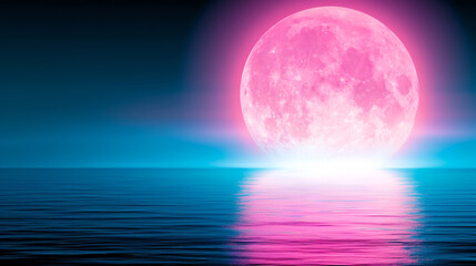 Bright pink moon reflecting on ocean water at night