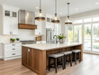 © YOGI C - Modern Farmhouse Kitchen Photo - White Cabinets, Wood Floors, and a Large Island