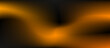 © paulmalaianu - Abstract black background with orange blurred gradient and copy space.