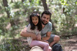© Antonio Recena - Father and daughter in the forest playing on log