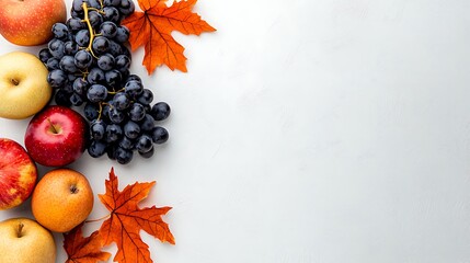 Wall Mural - Autumn fruits and grapes mingle with maple leaves on a white background, a seasonal celebration.