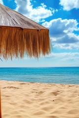 Wall Mural - Bamboo Umbrella with Fringe Against Blue Sky and Sea