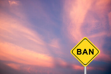 Poster - Yellow transportation sign with word ban on violet color sky background