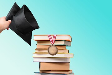 Sticker - Graduation cap and reading books for education day