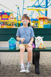 © Tamara Sales  - Little boy in a carnival eating candy and having fun fun spot in orlando