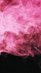 Poster - Red Smoke Effect Vertical 4K Footage on a black backdrop. Artificial smoke released on a dark background.