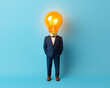 © javu - A man in a suit with a light bulb for a head, symbolizing innovative thinking