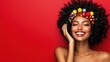 © GoodandEvil - Radiant woman with vibrant afro and Christmas beads.