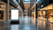 © altitudevisual - Modern indoor shopping mall with various clothing stores and a large illuminated blank advertisement display in the foreground.