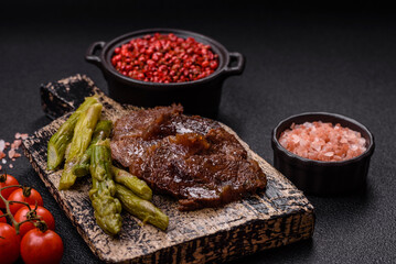 Juicy beef or pork cut into slices with boiled asparagus